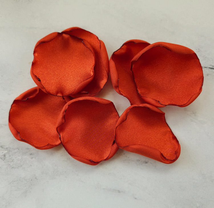 Shades of burnt orange and rust rose petals for fall wedding decor, table confetti and flower girl baskets