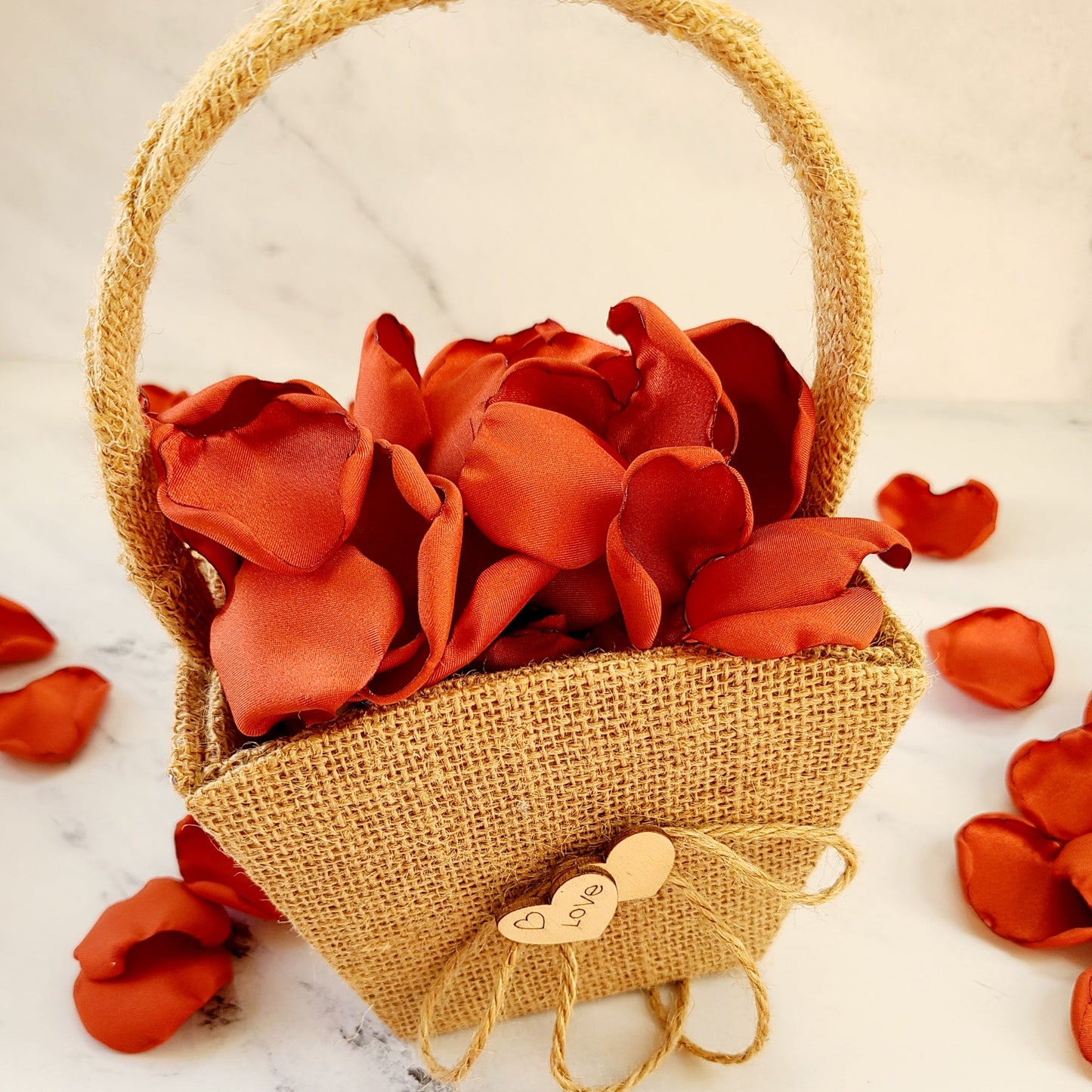 Rust Rose Petals in boho Western flower girl basket. Burnt Orange Rose Petals for flower girl baskets, fall wedding reception table decor, table confetti, aisle decorations, western, rustic wedding ideas, marriage backdrop props