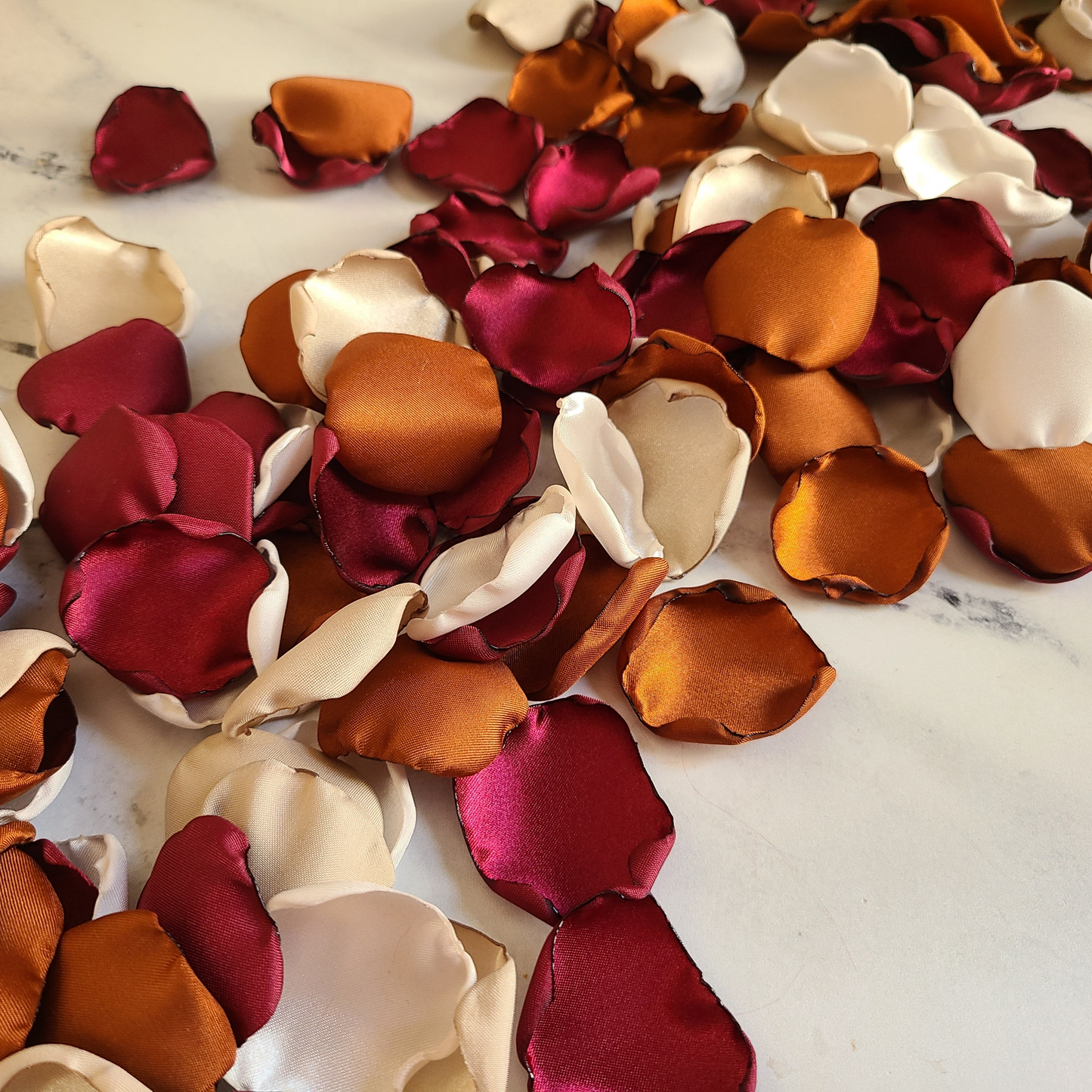 Burgundy, Burnt orange, Beige and Ivory rose petals for wedding aisle decor or for flower girl baskets. Burgundy, Terracotta, Beige rose petals for a Fall Wedding Theme. Flower petals for a flower girl to toss or put in a basket, Western wedding ideas, aisle decorations, marriage proposal props, table confetti
