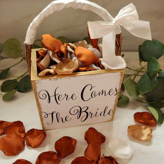 Here Comes the Bride Flower Girl Basket filled with Burnt Orange, Tane, Beige and Ivory rose petals for a Westen Rustic wedding ceremony, fall wedding decor