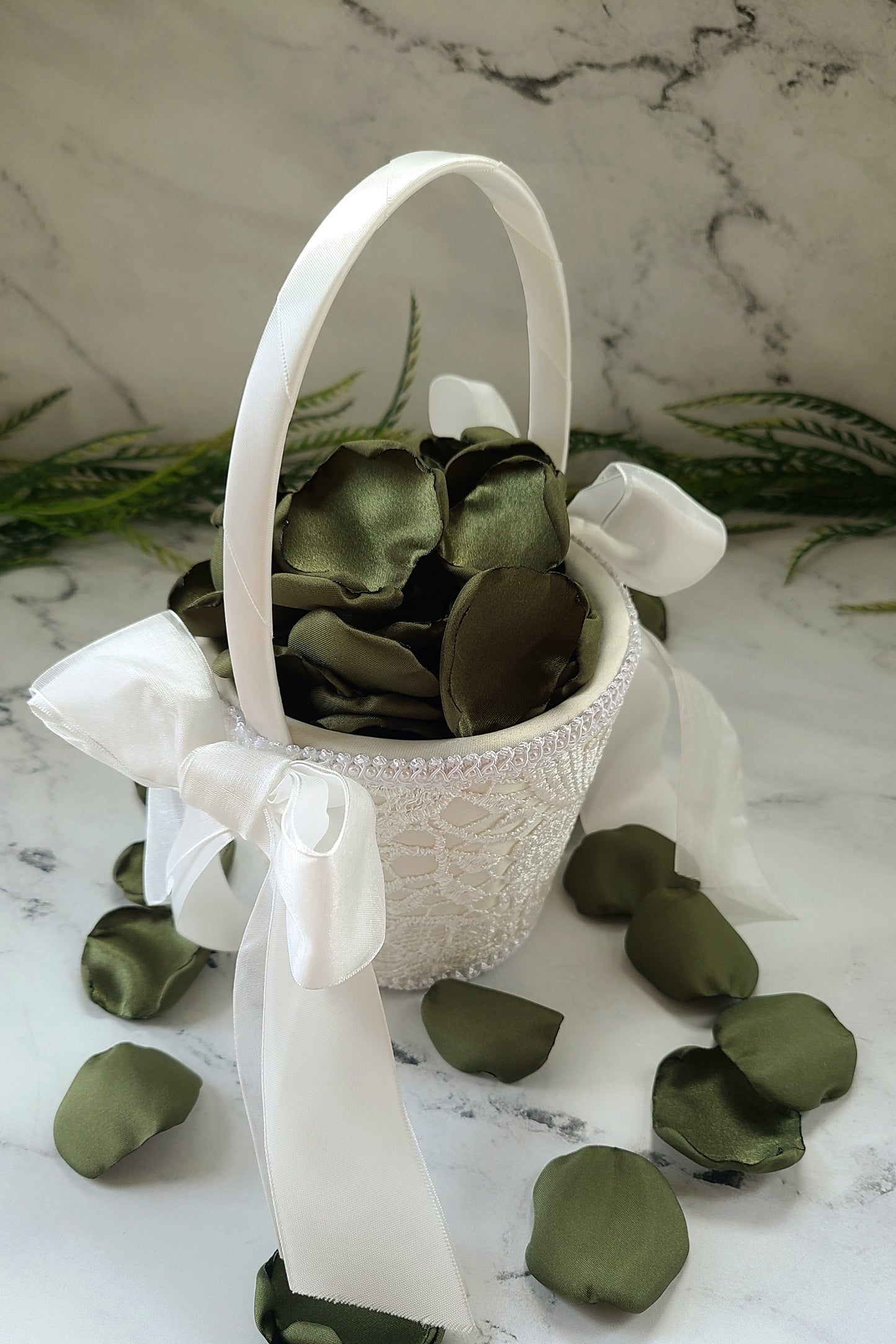 Ivory flower girl basket filled with Olive Green rose petals. engagement backdrop props, fall wedding decor, table confetti