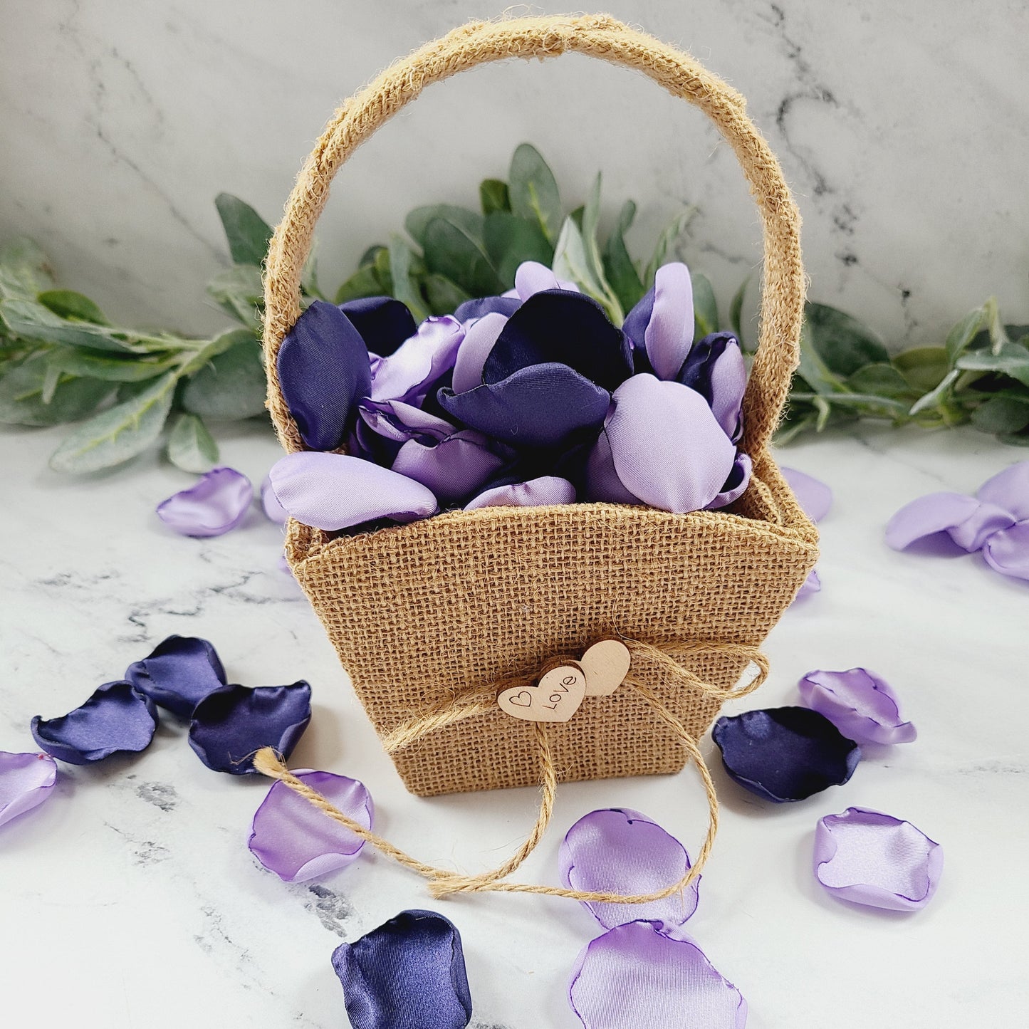 Navy and Lavender rose petals in Rustic Western Burlap flower girl basket