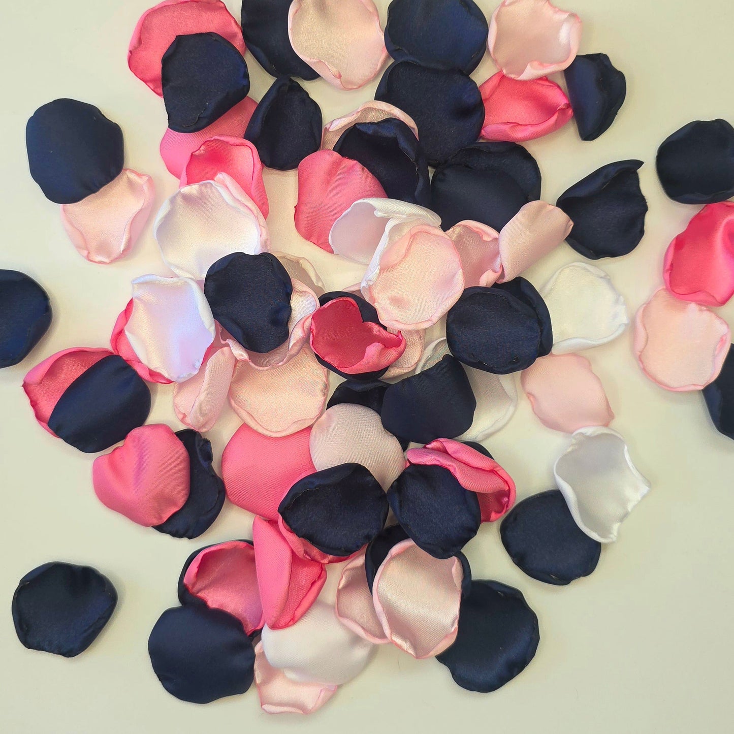 A mix of Candy pink, blush, white and navy blue rose petals for flower girl toss, baskets and aisle decor. For future brides planning a romantic, classic wedding ceremony or sping, whimsical bridal shower event.