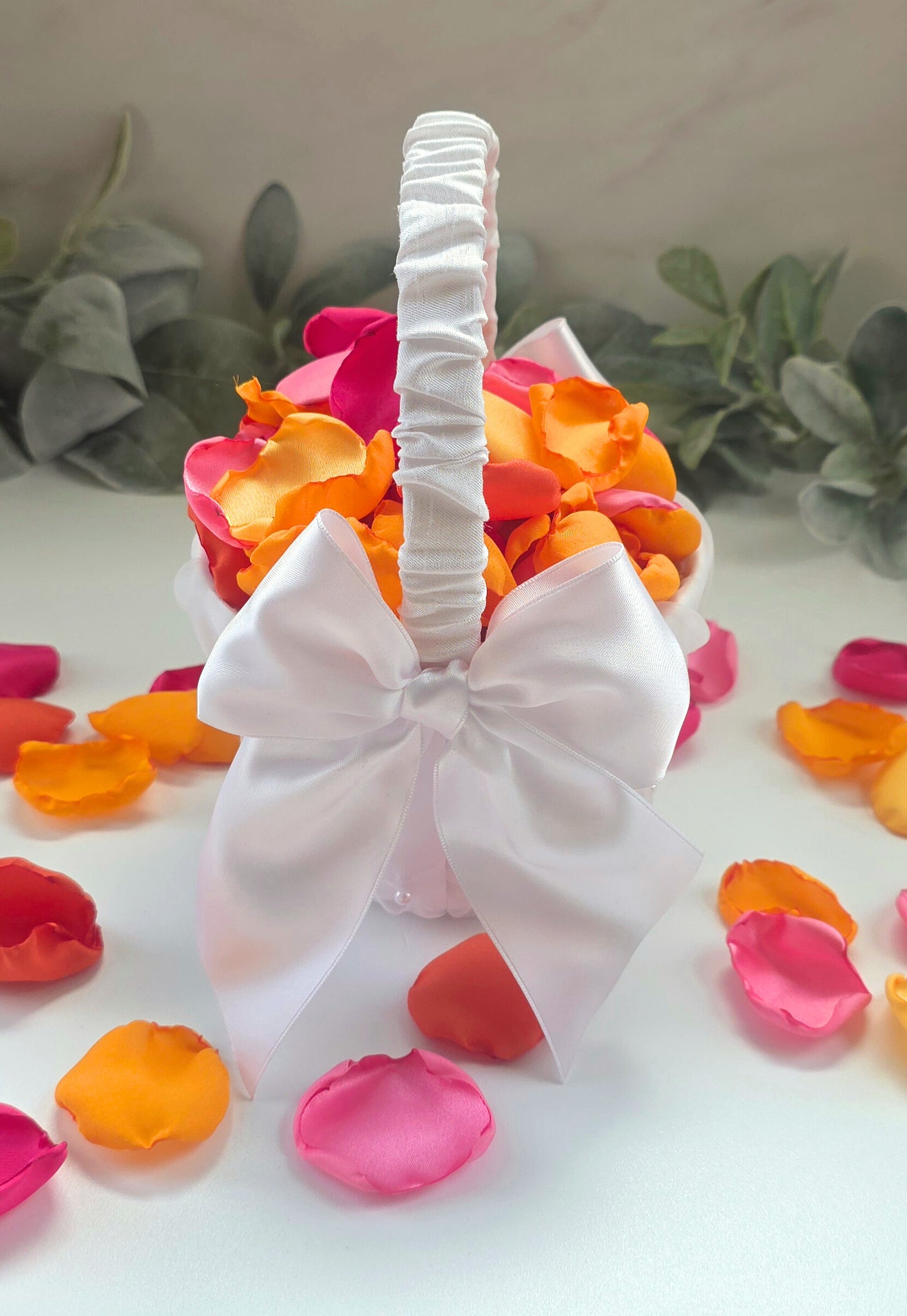 mix of pink, fuchsia, yellow, tangerine and orange rose petals. For flower girl toss, aisle decor, reception tablescapes confetti scatter. for future brides using a sunset wedding color palette to plan a bridal shower event or wedding ceremony.