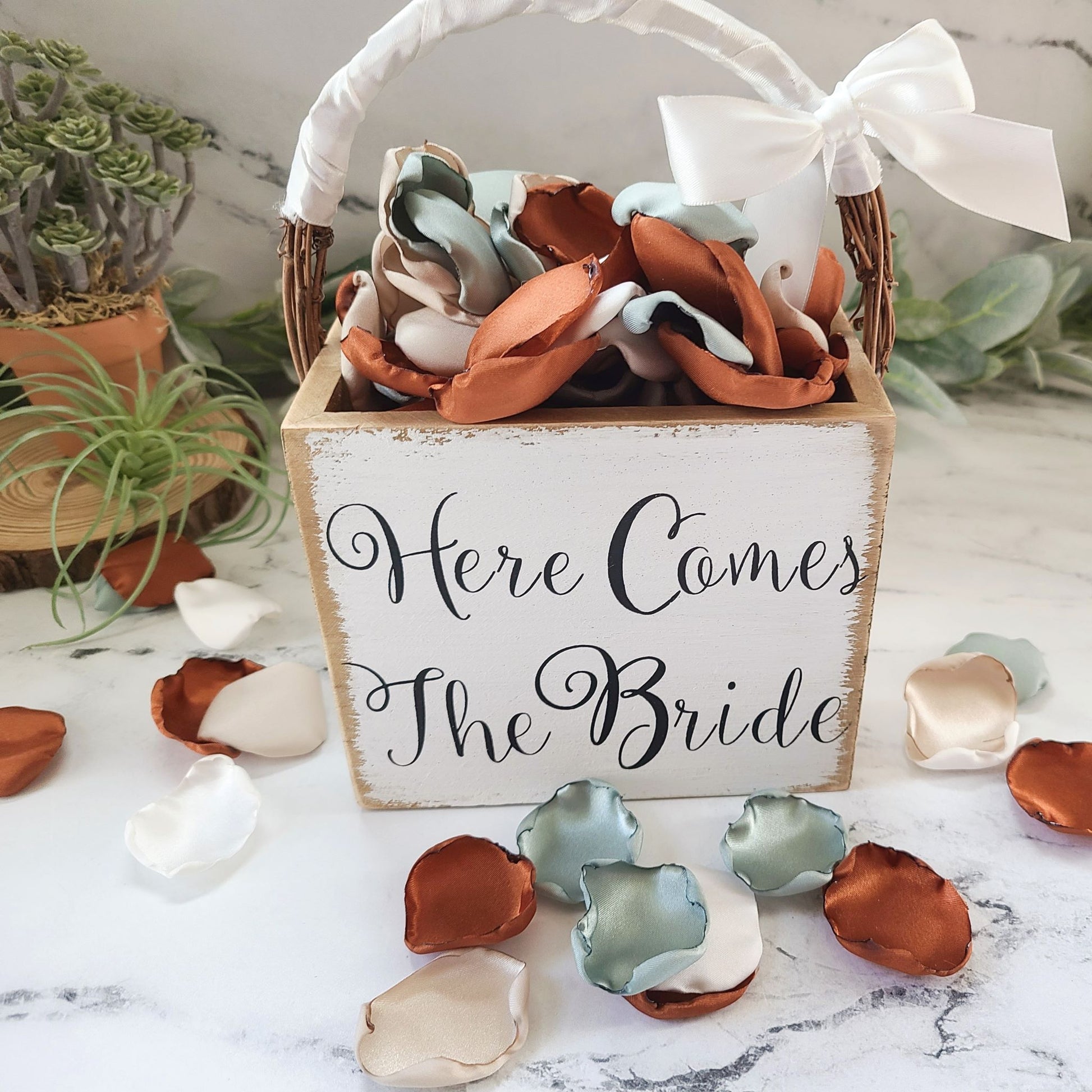 Here Comes the Bride flower girl basket filled with Dusty Sage, Terracotta, Beige & Ivory rose petals for a fall wedding decor theme ideas, flower girl petals, aisle decorations, table confetti, bridesmaid box, engagement backdrop proposal ideas
