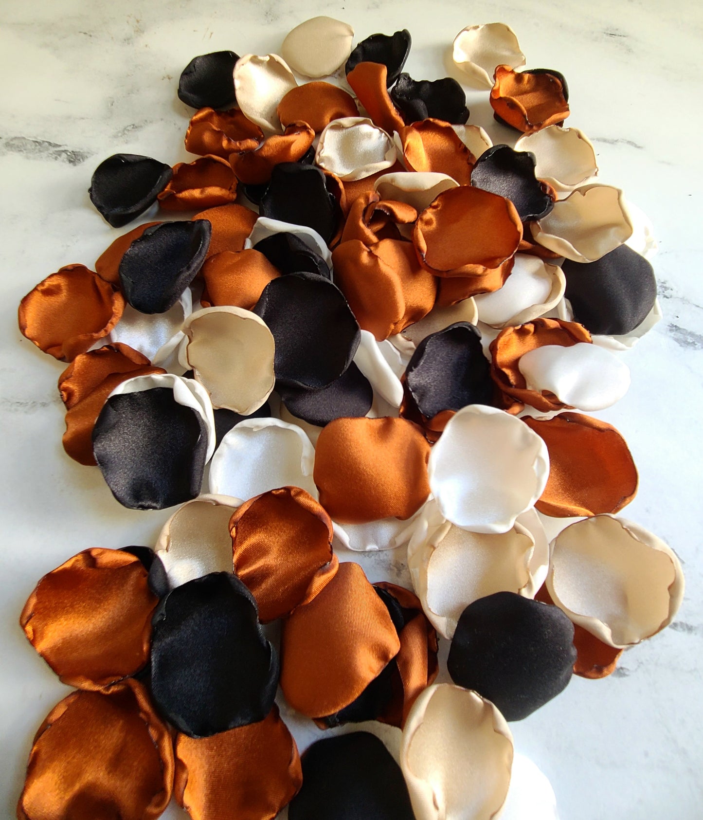 Fall wedding decor using Burnt Orange, Ivory, beige, black rose petals. Flower girl petals for tossing, aisle decor or table confetti, custom color options