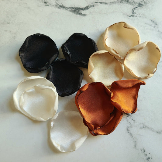 Fall wedding decor using Burnt Orange, Ivory, beige, black rose petals. Flower girl petals for tossing, aisle decor or table confetti, custom color options