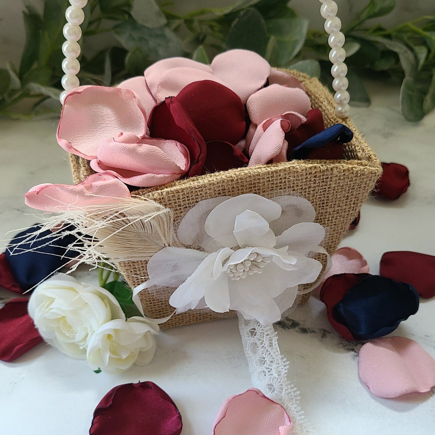 Navy, blush pink, burgundy rose petals in Western Rustic flower girl basket