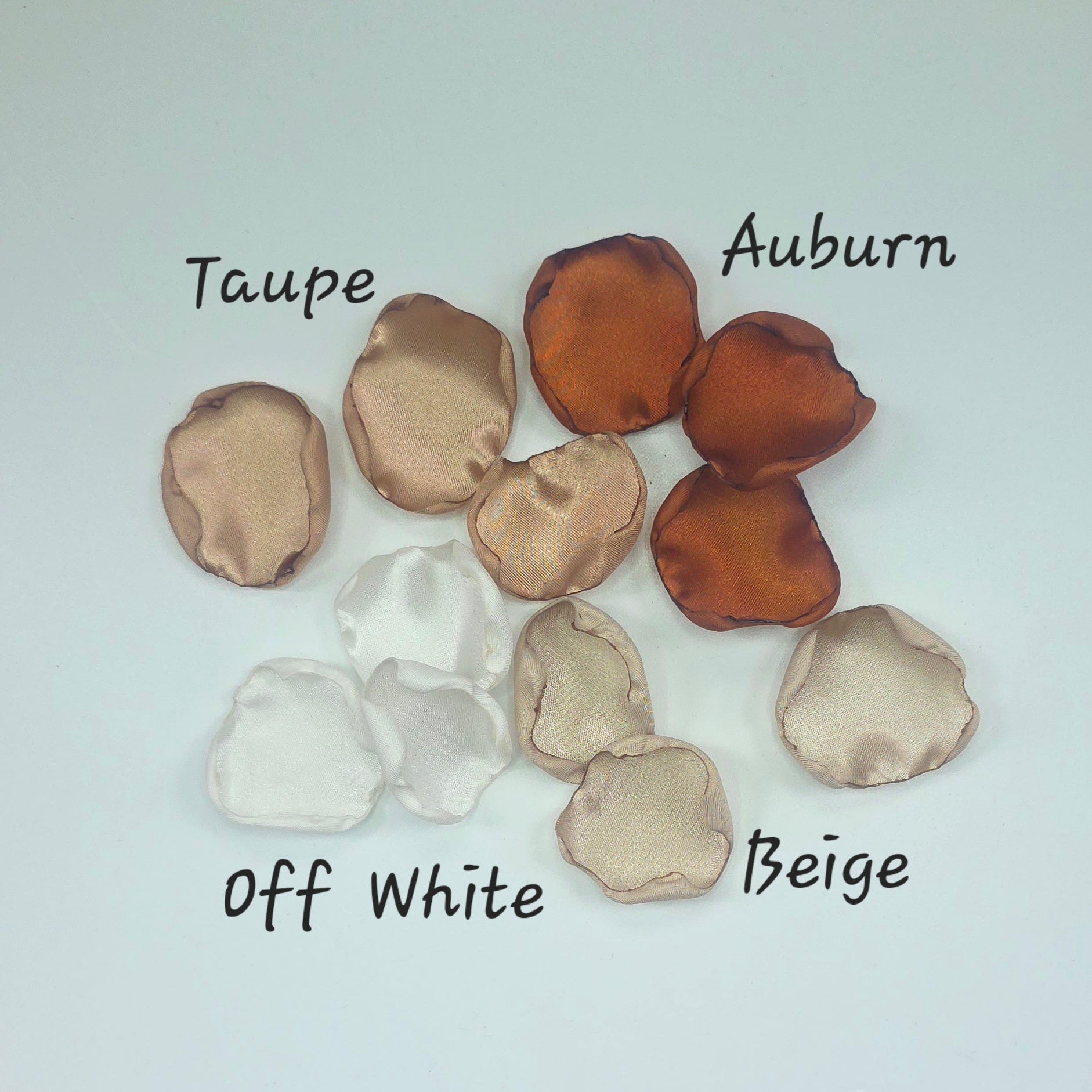 A mix of rose petals featuring an Auburn, terracotta, burnt orange color palette that includes beige, taupe and off white petals. Perfect for flower girl baskets and tossing, aisle decor, flatlays, reception tablescape decorations, table scatter and confetti toss. Ideas for the future bride planning a fall wedding ceremony or a boho western bridal shower event.