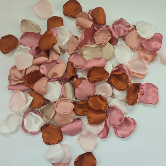 Auburn, burnt orange, beige, blush pink rose petals for flower girl tossing, aisle decor, flatlays, backdrop accents or tablescape table scatter, decor ideas. A fall color palette for the future bride planning a western, rustic wedding ceremony or natural, nuetral colored bridal shower event