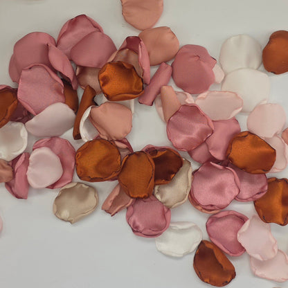 Auburn, burnt orange, beige, blush pink rose petals for flower girl tossing, aisle decor, flatlays, backdrop accents or tablescape table scatter, decor ideas. A fall color palette for the future bride planning a western, rustic wedding ceremony or natural, nuetral colored bridal shower event