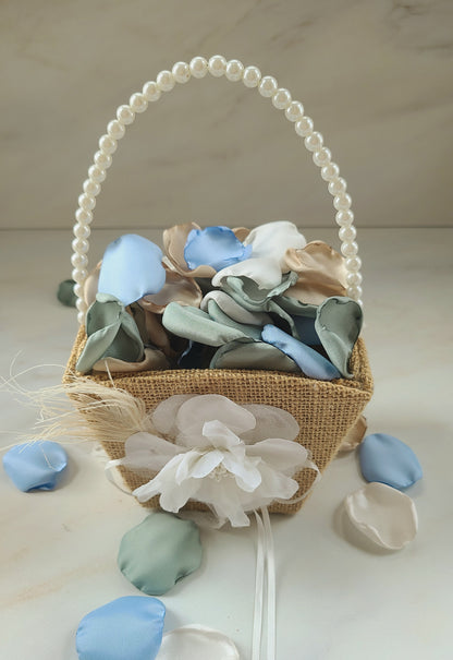 Boho flower girl basket filled with Sky blue, ivory, beige and dusty sage rose petals