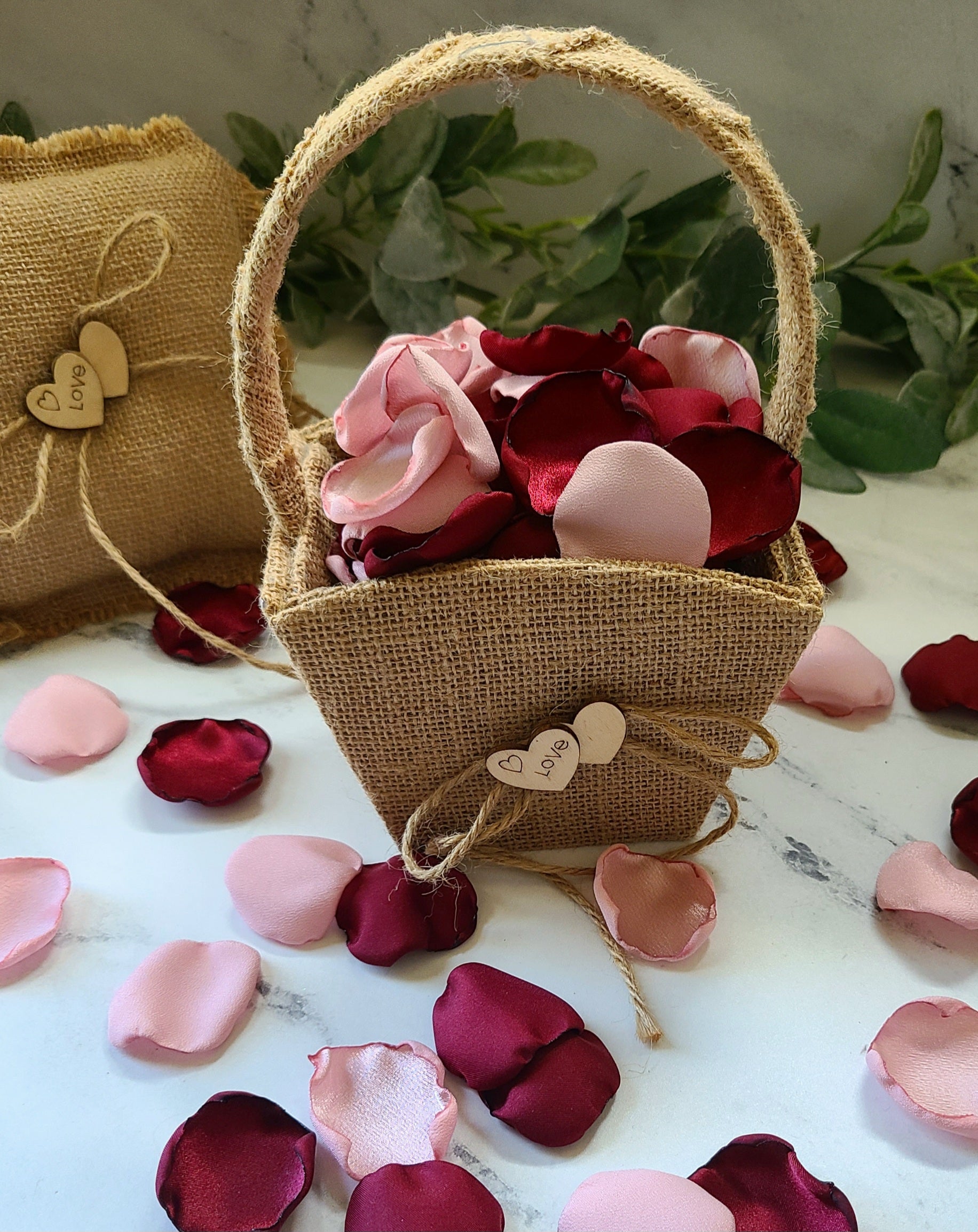 Burgundy Blush Pink rose petals in a western flower girl basket, 
