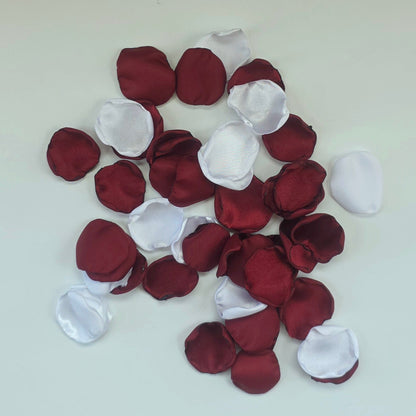 Burgundy, White rose petals for flower girl tossing, aisle decor, classic fall wedding decor. Ideas for future brides planning an elegant wedding ceremony or bridal shower event.