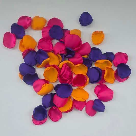 A mix of mango orange, dark purple and fuchsia pink rose petals. Perfect for flower girl tossing, flat lays, reception table decor, aisle decor and table scatter confetti. A bold bright colorful palette for future brides planning a wedding ceremony or bridal shower brunch event.