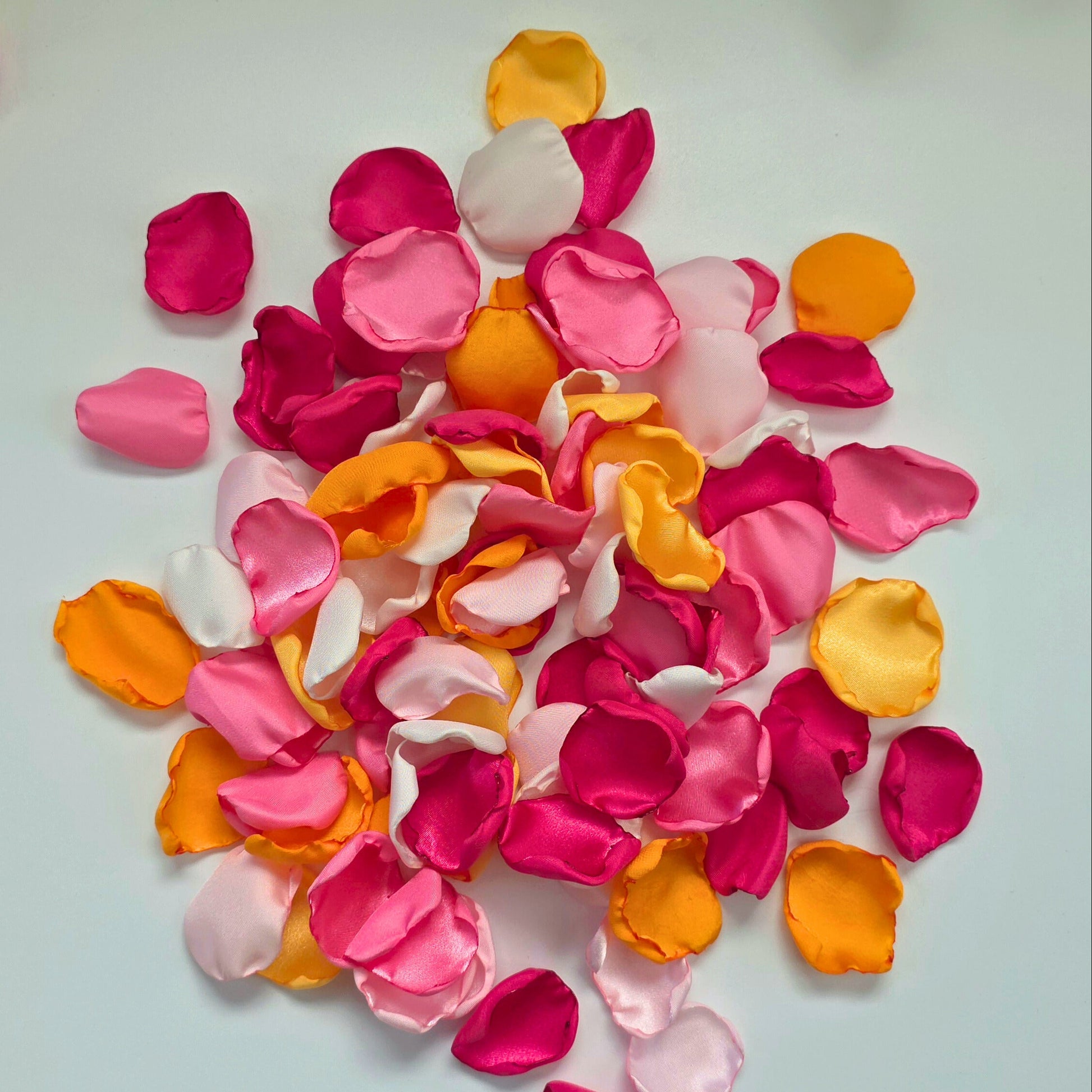Orange, Yellow, Pink and Fuchsia rose petals for a Whimsical wedding theme color ideas, Petals scattered on tablescape, flower girl tossing, confetti scatter, backdrop accents