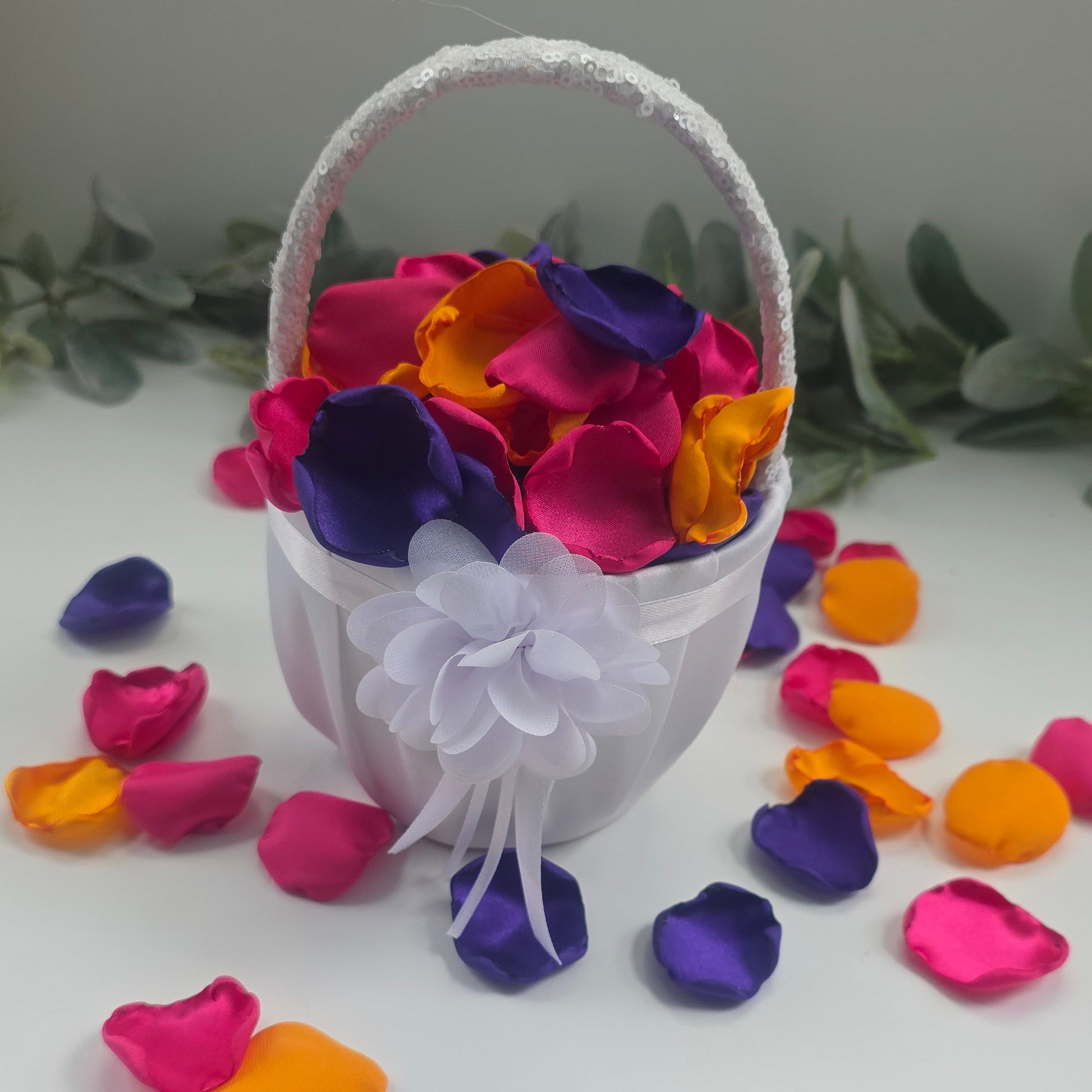A mix of Fuchsia, Candy Pink, Dark Purple and Sunflower Yellow rose petals in white flower . For flower girl tossing,  aisle decor, reception tablescape scatter, backdrop accents or wedding decor. A bold colorful palette for future brides planning a golden hour sunset wedding ceremony or whimsical bridal shower brunch event.irl basket 