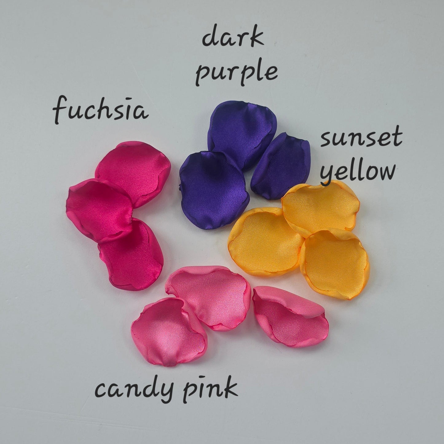 A mix of Fuchsia, Candy Pink, Dark Purple and Sunflower Yellow rose petals. For flower girl tossing,  aisle decor, reception tablescape scatter, backdrop accents or wedding decor. A bold colorful palette for future brides planning a golden hour sunset wedding ceremony or whimsical bridal shower brunch event.