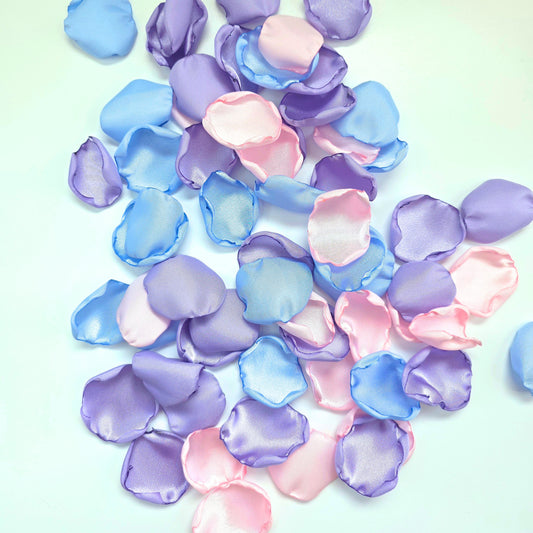 A mix of lavender, pink and sky blue rose petals for flower girl toss, aisle decor or reception tablescapes accents. Bridal shower decoraions. Ideas for future brides using a Whimiscal wedding color palette