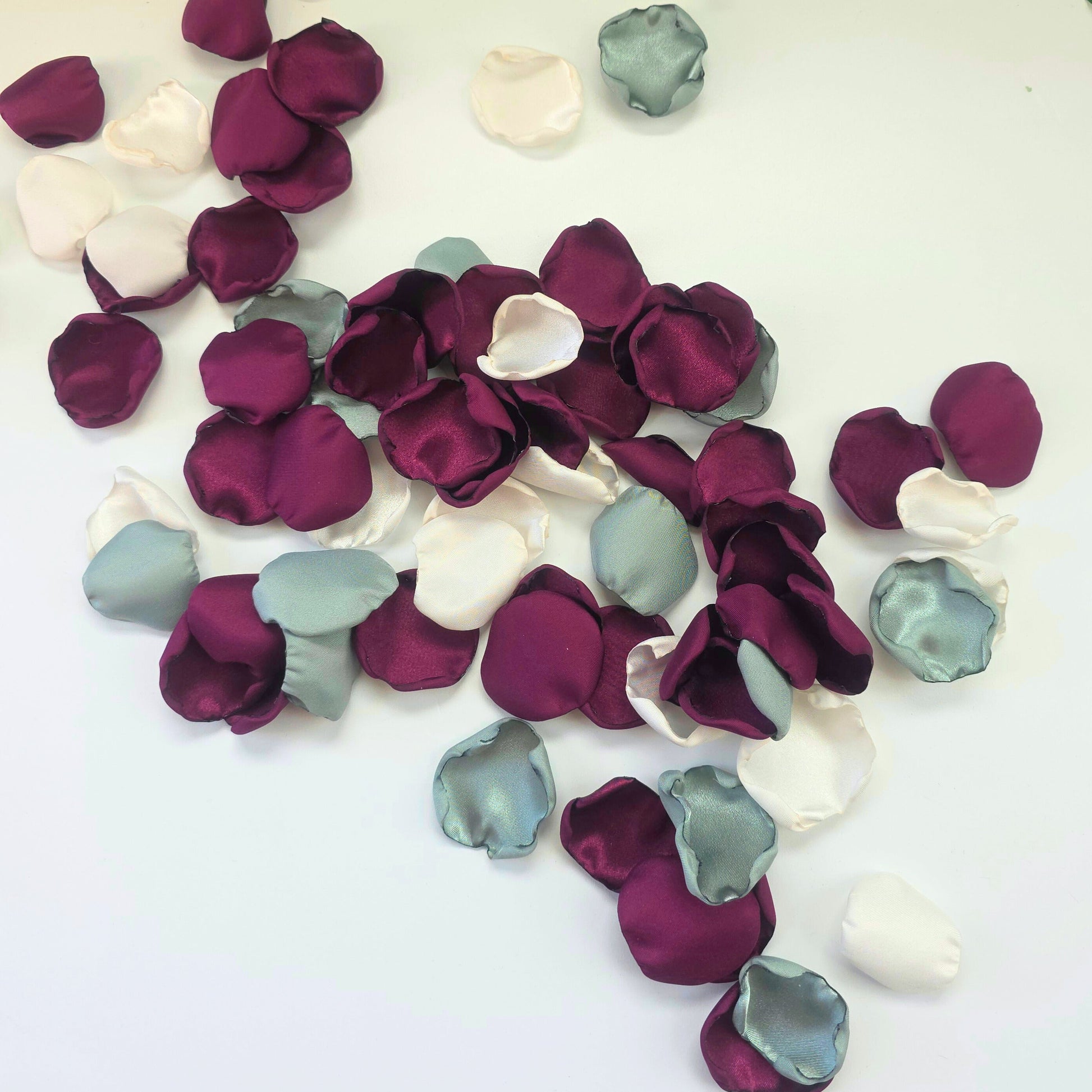 Mulberry Plum, Ivory, Sage rose petals on tabletop. Used for flower girl toss or basket. Perfect for wedding aisle decor, confetti scatter, reception tablescapes accents, fall wedding decor, engagement photo props, ceremony backdrop accents