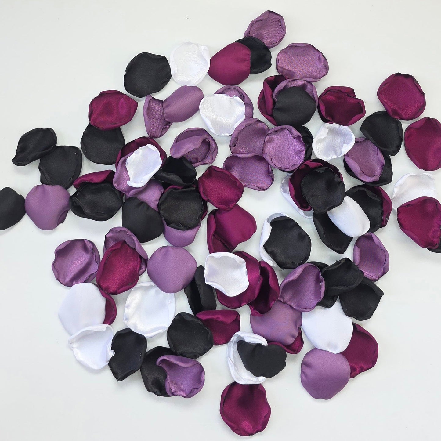 Fig, Plum, black, white, and Wisteria Purple rose petals. For flower girl tossing, baskets, church pew, aisle decor, flatlays, table scatter, reception table decorations. A fall color palette for a future bride planning a celestial themed wedding or nautical bridal shower event.