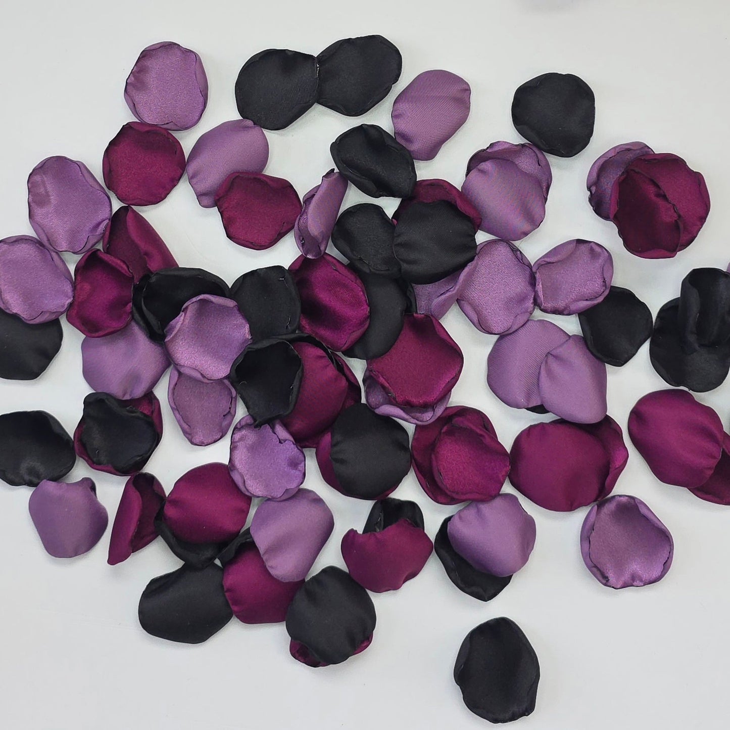 Fig, Plum, black and Wisteria Purple rose petals. For flower girl tossing, baskets, church pew, aisle decor, flatlays, table scatter, reception table decorations. A fall color palette for a future bride planning a celestial themed wedding or nautical bridal shower event.