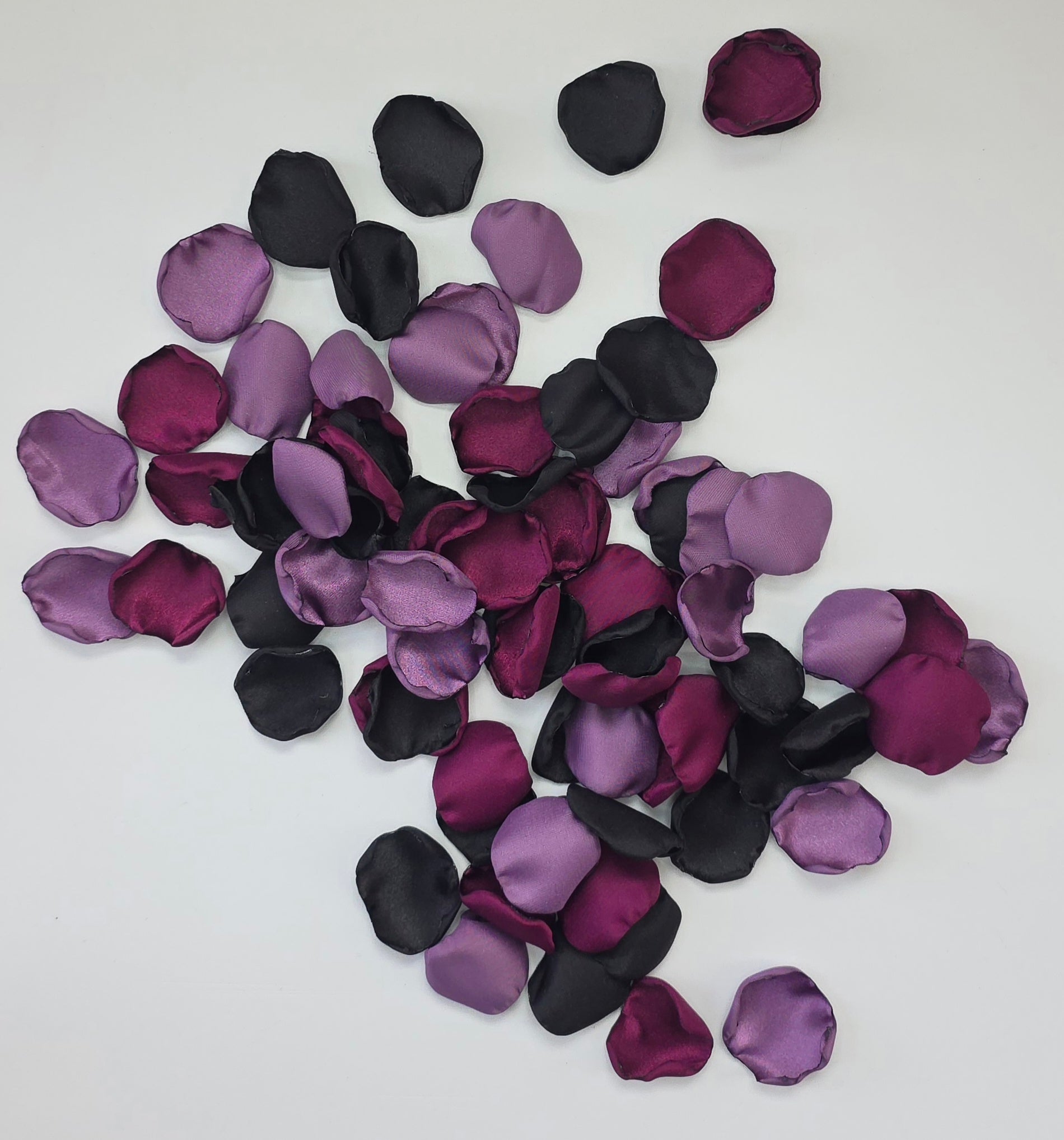 Fig, Plum, black and Wisteria Purple rose petals. For flower girl tossing, baskets, church pew, aisle decor, flatlays, table scatter, reception table decorations. A fall color palette for a future bride planning a celestial themed wedding or nautical bridal shower event.