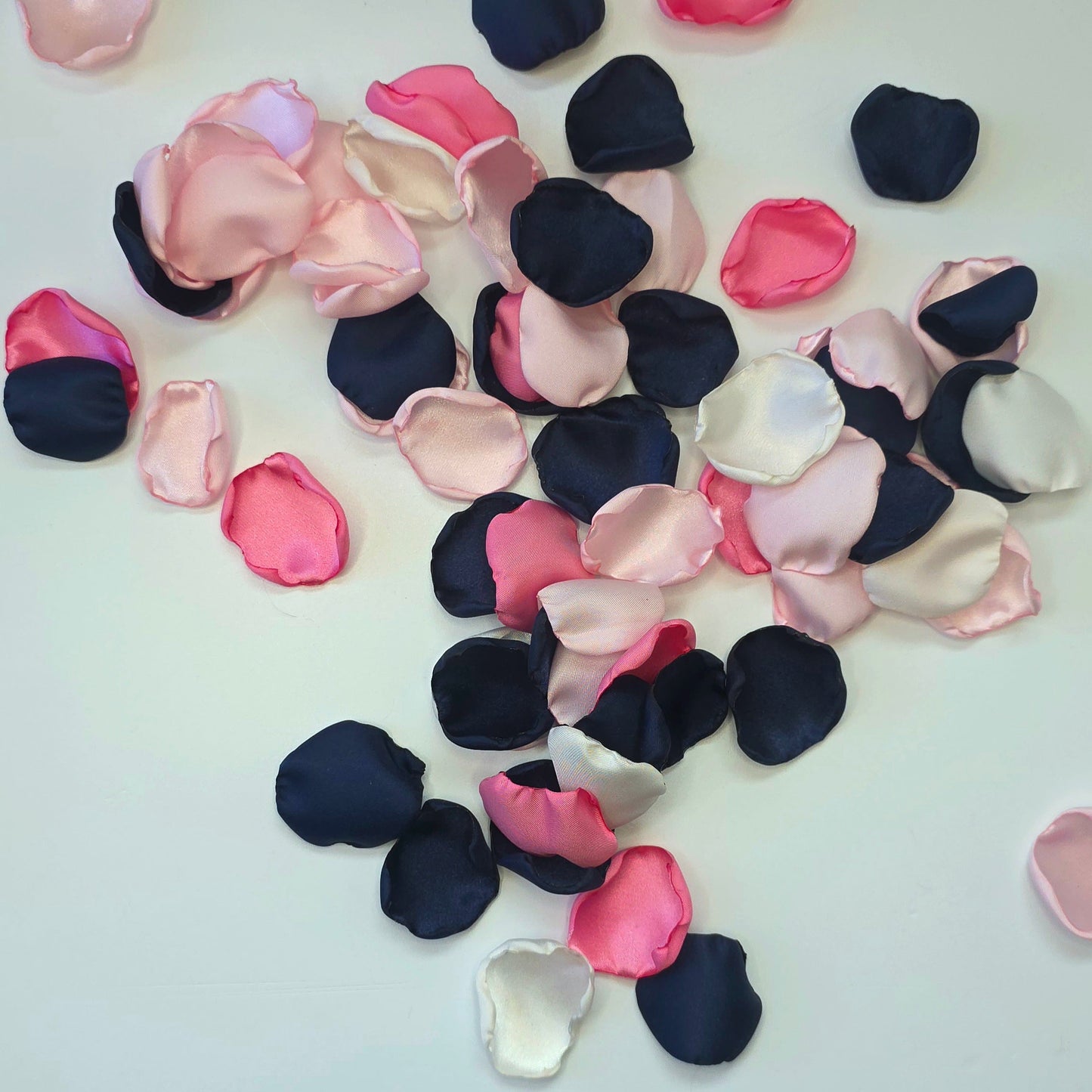 A mix of Candy pink, blush, ivory and navy blue rose petals for flower girl toss, baskets and aisle decor. For future brides planning a romantic, classic wedding ceremony or sping, whimsical bridal shower event.