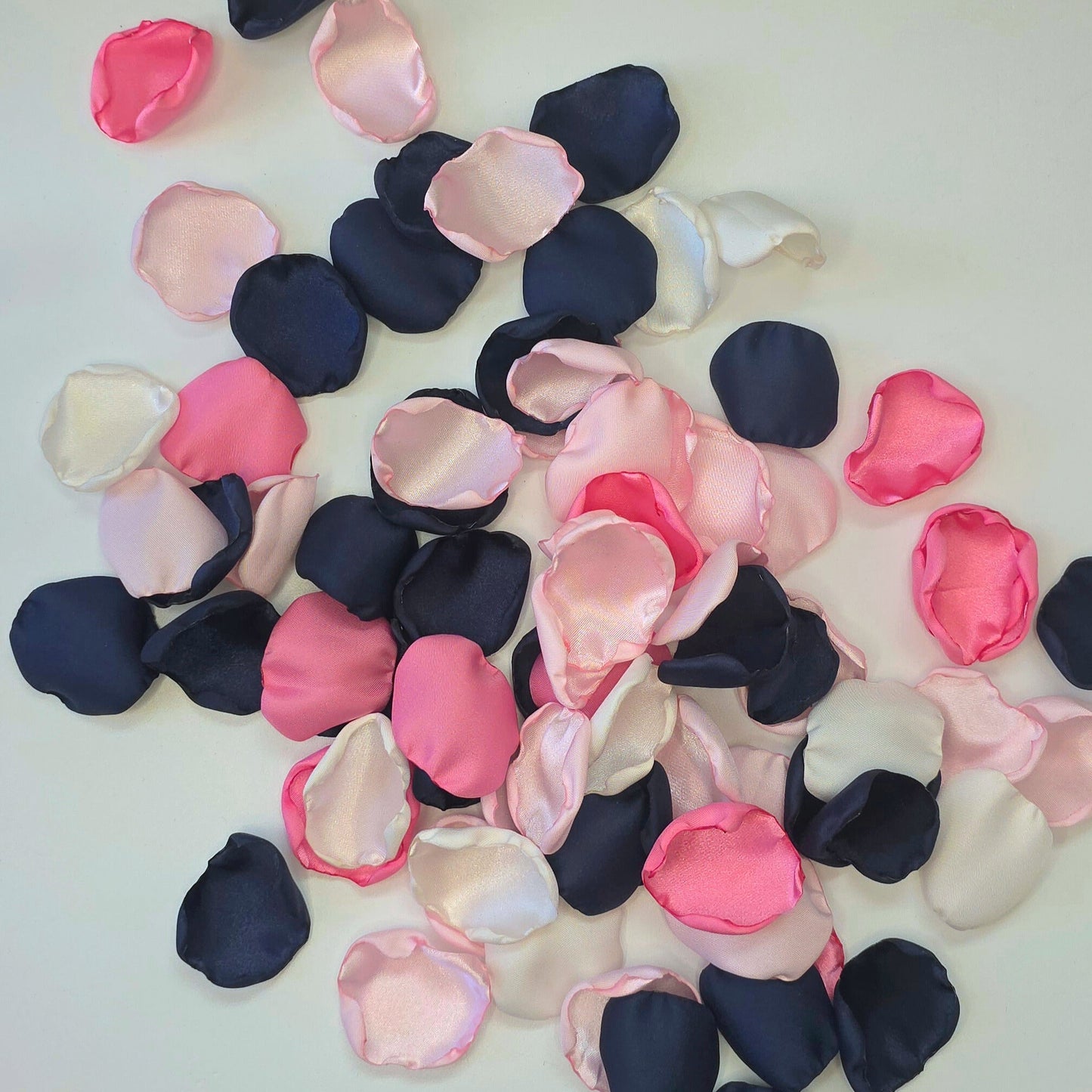 A mix of Candy pink, blush, ivory and navy blue rose petals for flower girl toss, baskets and aisle decor. For future brides planning a romantic, classic wedding ceremony or sping, whimsical bridal shower event.