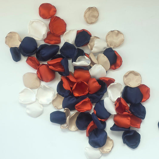 A mix of Burnt Orange, Beige, Ivory and Navy blue rose petals for fall wedding decor, flower girl toss, table scatter and aisle decor. Ideas for color palette ideas for future brides planning a western wedding ceremony or boho bridal shower event.