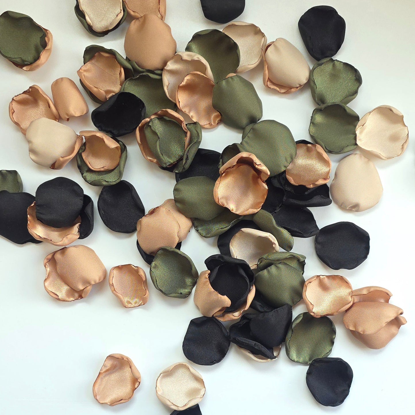 A mix of olive green, tan, beige and black rose petals. Perfect for flower girl tossing, flatlays, table scatter, confetti exit,wedding aisle decor.  For future brides planning a Camouflage wedding or hunting couples shower event.