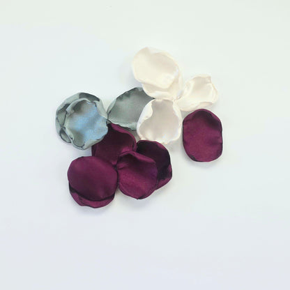 Mulberry Plum, Ivory, Sage rose petals on tabletop. Used for flower girl toss or basket. Perfect for wedding aisle decor, confetti scatter, reception tablescapes accents, fall wedding decor, engagement photo props, ceremony backdrop accents. future bride color palette ideas