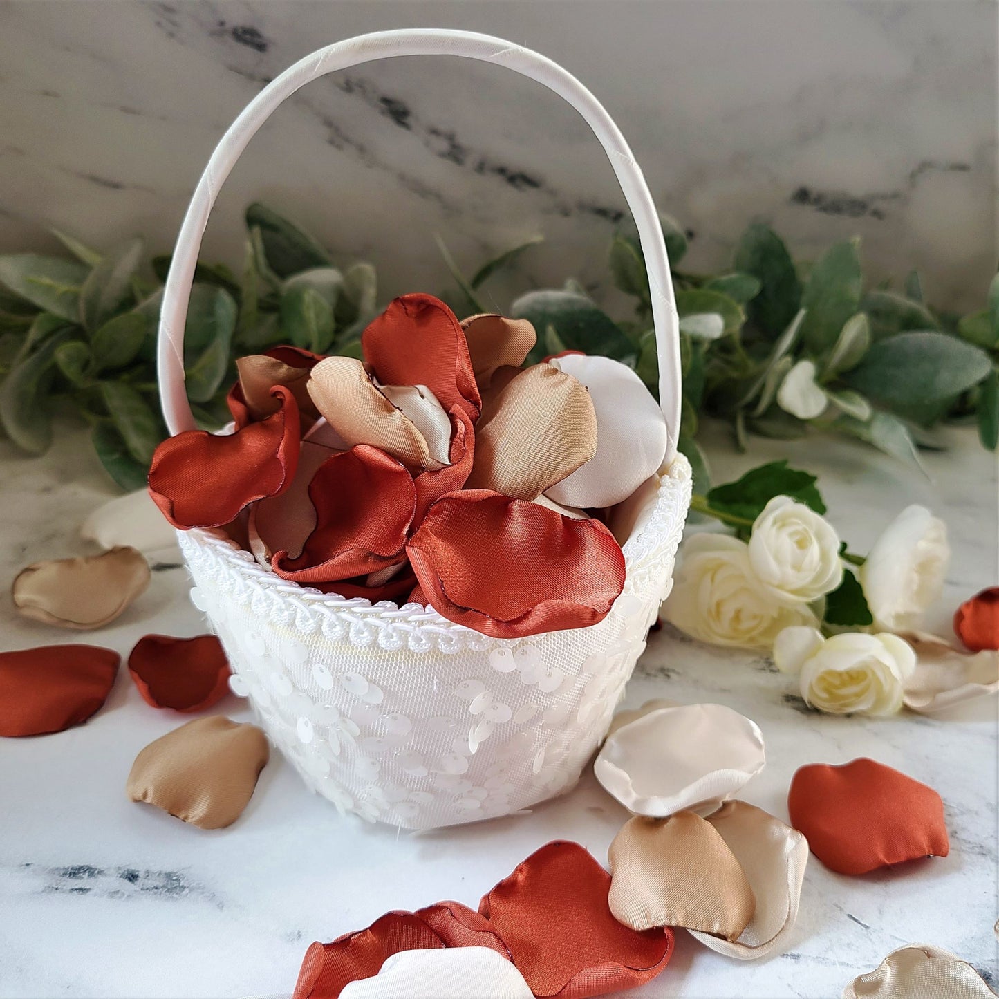 Rust and Burnt Orange Rose Petals in White Flower Girl Basket. She Said Yes! Wedding Decor