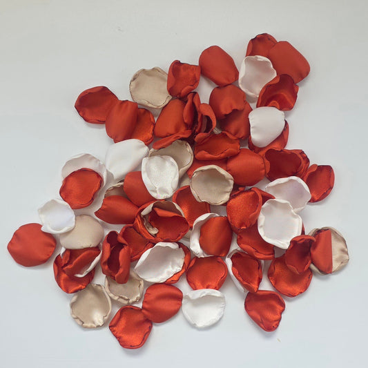 A mix of burnt orange, rust, ivory and beige rose petals for flower girl toss, baskets, photo flat lays, or reception tablescape confetti scatter. Color palette ideas for future brides planning a wedding ceremony or bridal shower event.