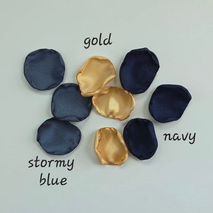 A mix of Gold, Navy, twilight. dusk stormy blue rose petals. Perfect for flower girl tossing, wedding aisle decor, confetti, tablescapes accents, backdrop scatter. For future brides planning a celestial wedding or bridal shower event. 