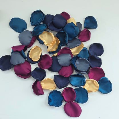 Teal Fig Mulberry, gold, navy and stormy blue rose petals for a twilight starry night, celestial themed wedding ceremony or bridal shower table scatter, confetti. A Fall color palette for a future bride planning a jewel-toned wedding.