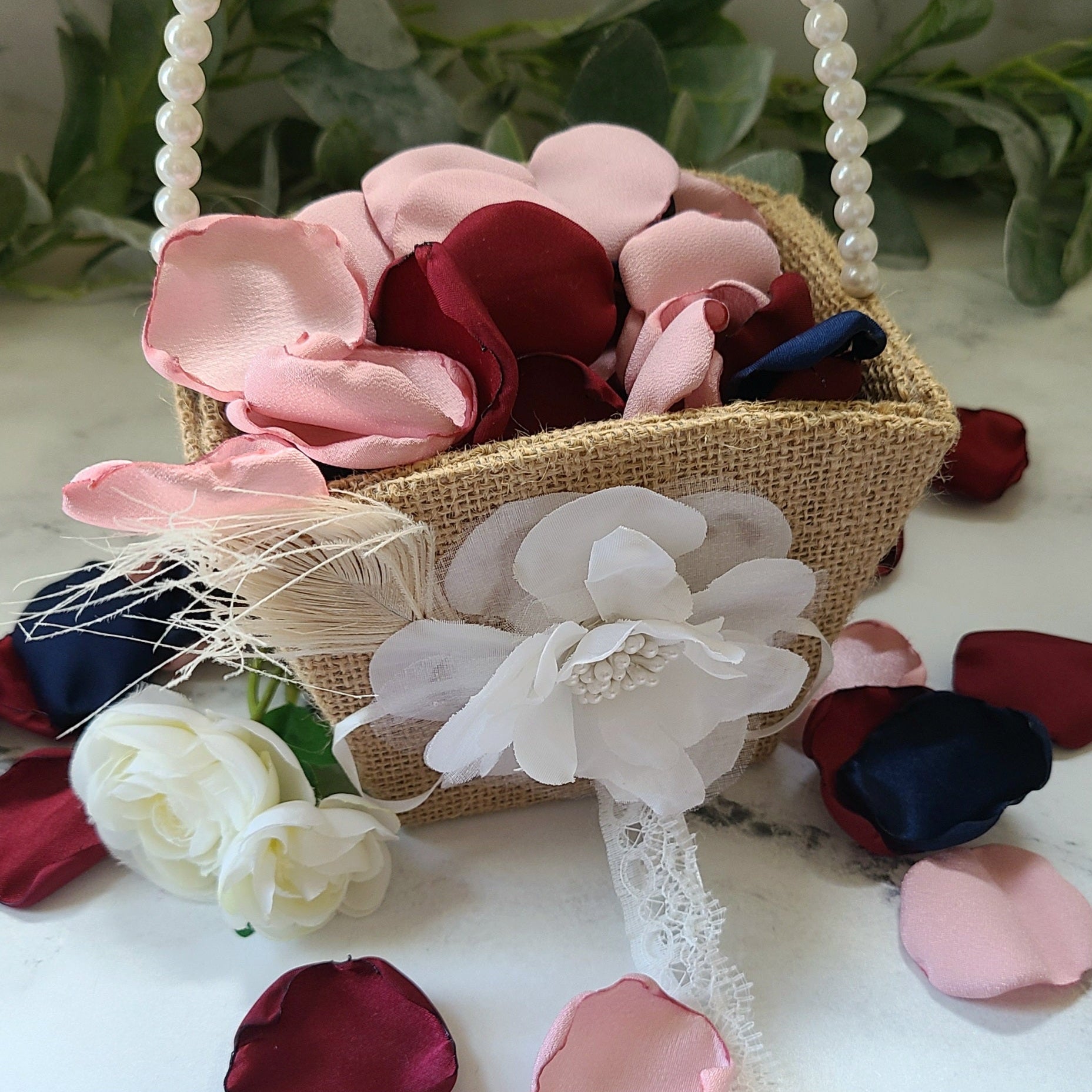 Navy, blush pink, burgundy rose petals in Western Rustic flower girl basket