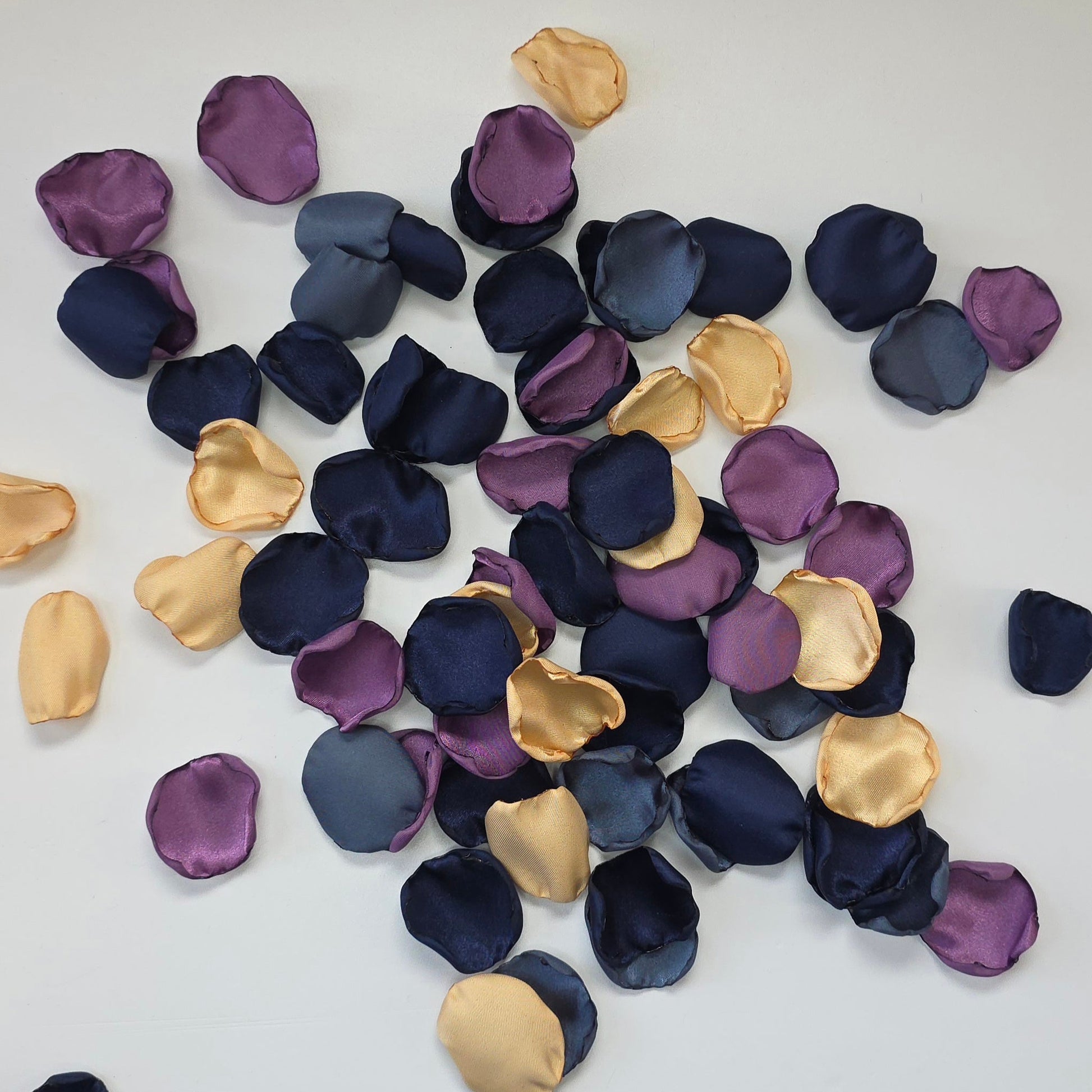 Wisteria Purple, Gold, Stormy and Navy blue rose petals. Perfect for flower girl baskets, tossing, confetti, aisle decor or table scatter. reception tablescape decor. A color palette for future brides planning a moody fall wedding ceremony or a celestial bridal shower, brunch event.
