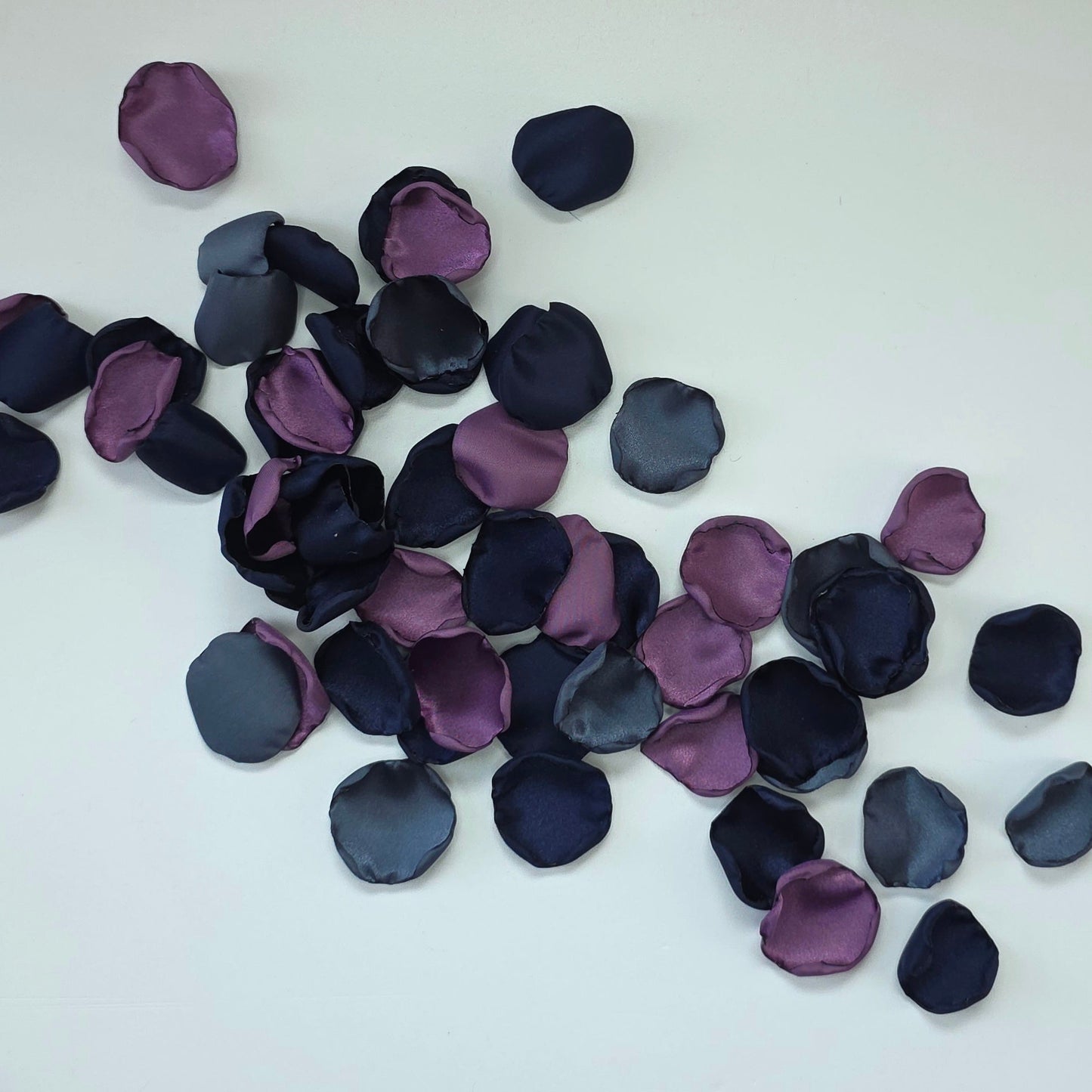 Wisteria Purple, Stormy and Navy blue rose petals. Perfect for flower girl baskets, tossing, confetti, aisle decor or table scatter. reception tablescape decor. A color palette for future brides planning a moody fall wedding ceremony or a celestial bridal shower, brunch event.
