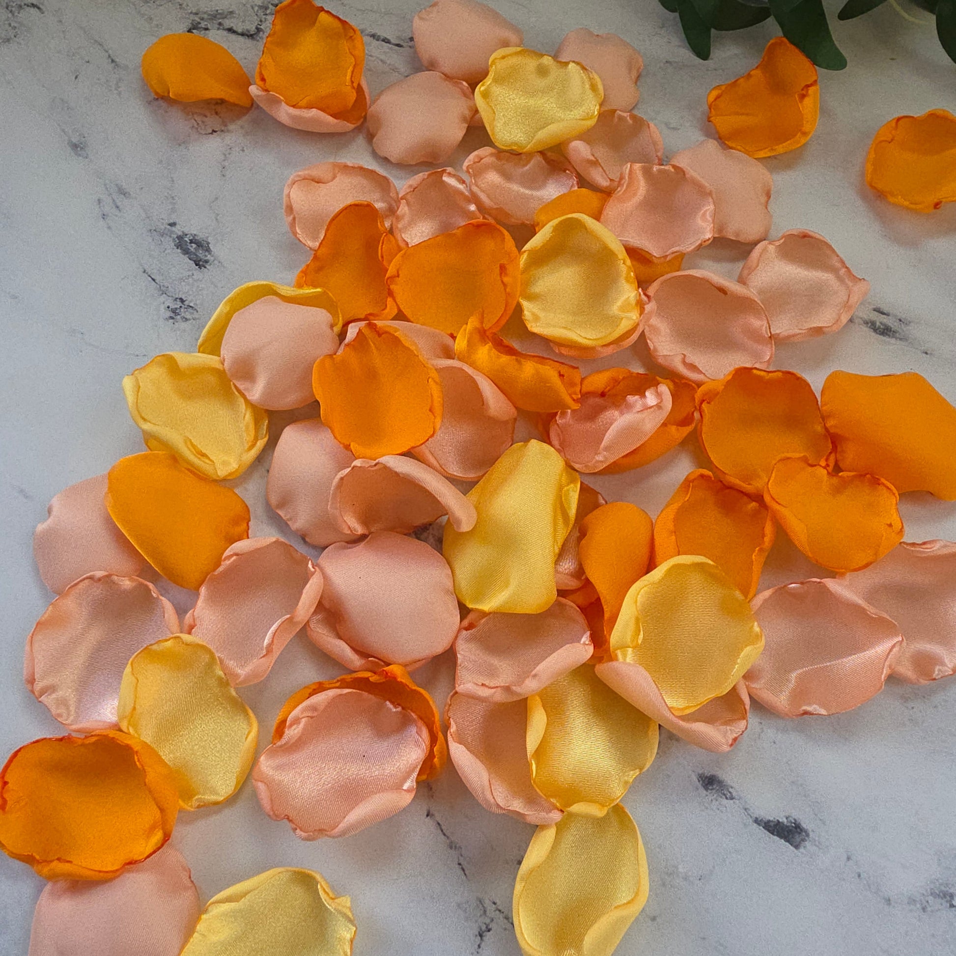 Yellow, Peach Blush, Orange rose petals showcased on table. Perfect for flower girl tossing, wedding aisle decor, reception tablescapes, confetti scatter,  memory table accents, Sunset Wedding Theme Ideas