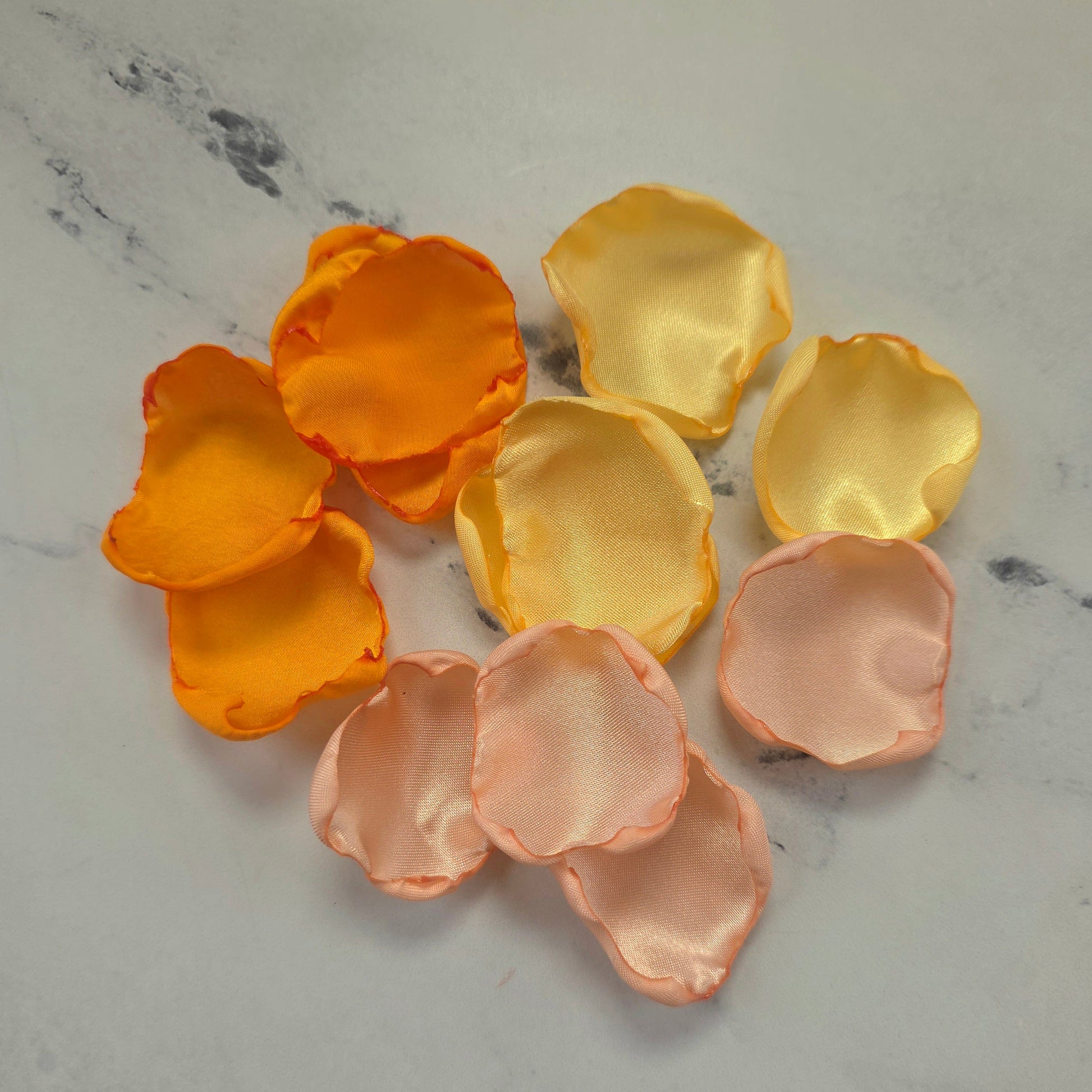 Yellow, Peach Blush, Orange rose petals showcased on table. Perfect for flower girl tossing, wedding aisle decor, reception tablescapes, confetti scatter, memory table accents, Sunset Wedding Theme Ideas
