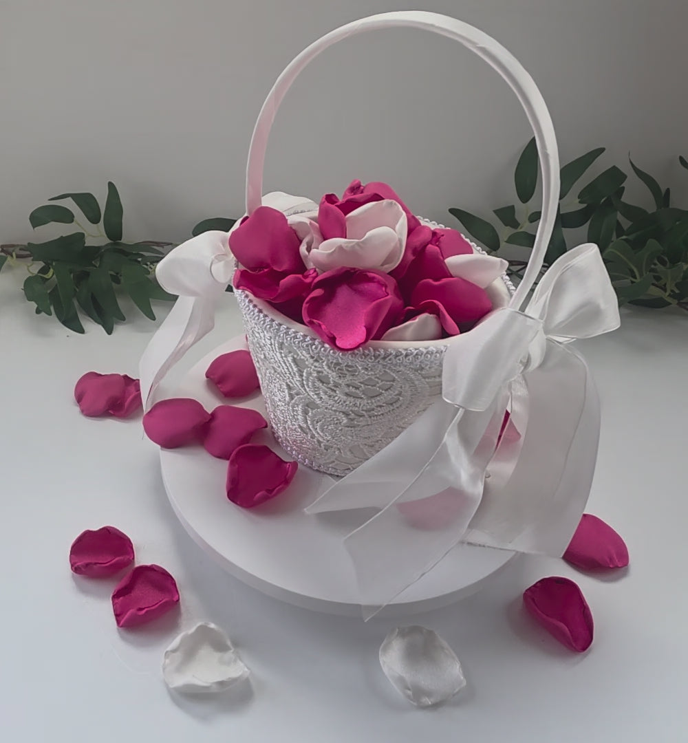 Load video: Fuchsia &amp; Ivory rose petals showcased in an Ivory Flower girl basket. Perfect for the flower girl to toss, wedding aisle decor, table confetti scatter.