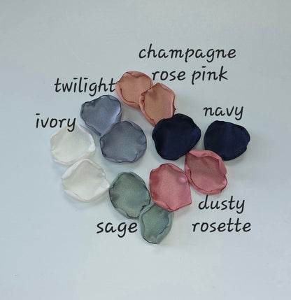 A mix of Dusty Blue, Navy, Dusty Rose, champagne rose pink, dusty sage rose petals. Perfect for flower girl tossing, aisle decor, inspo for wedding decor, tablescape scatter or backdrop accents. A color palette for a future bride planning a wedding ceremony or bridal shower brunch event.